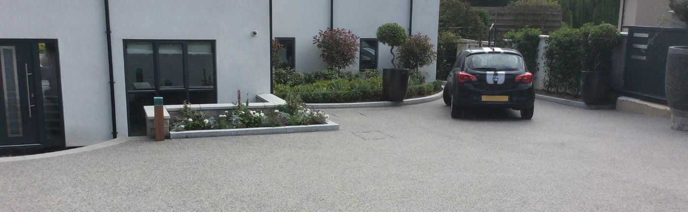 resin driveway with car